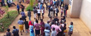 Students gather outside the lecturer hall at Mzumbe University, Tanzania